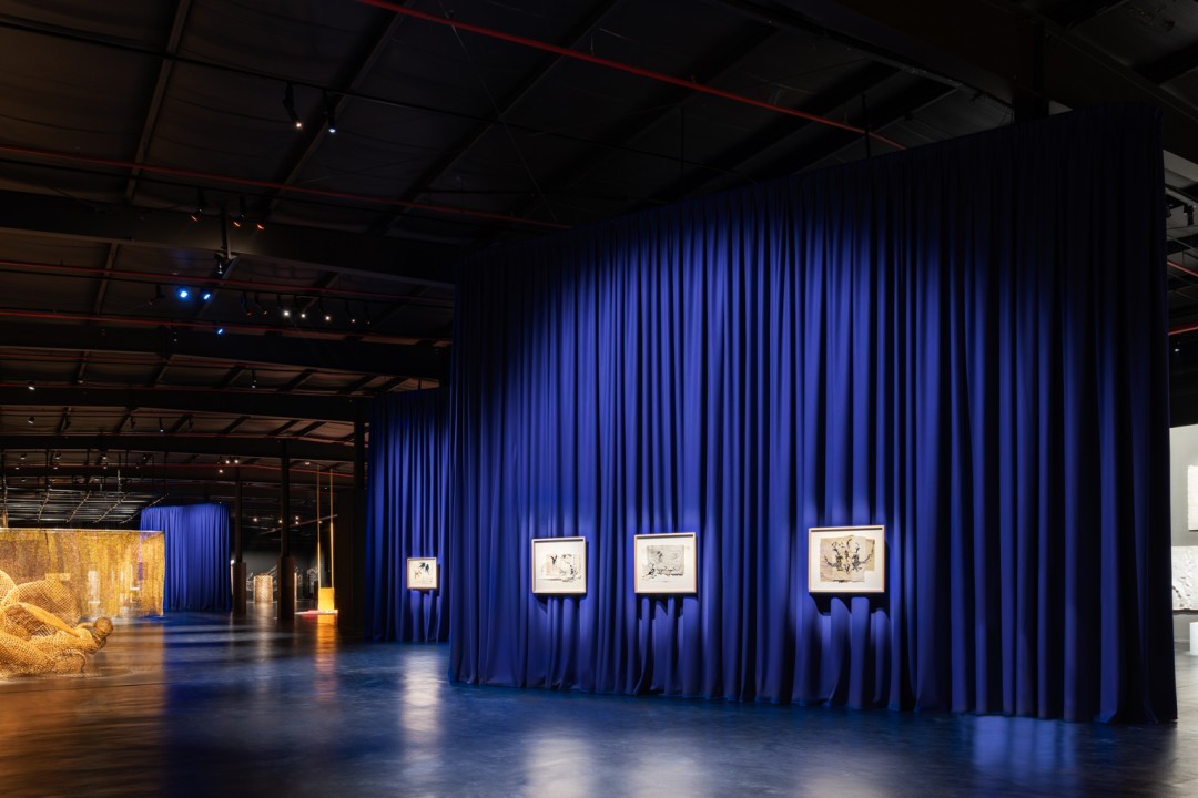 After Rain, Diriyah Contemporary Art Biennale 2024, installation view, Asma Bahmim, works  from the series Fantasia (2022); works by Sopheap Pich, El Anatsui, Sara Abdu, and  Rossella Biscotti in background.